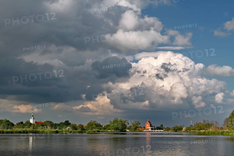 View of the town of Loitz an der Peene with cloud formation, Flusslandschaft Peenetal nature park Park, Mecklenburg-Western Pomerania, Germany, Europe