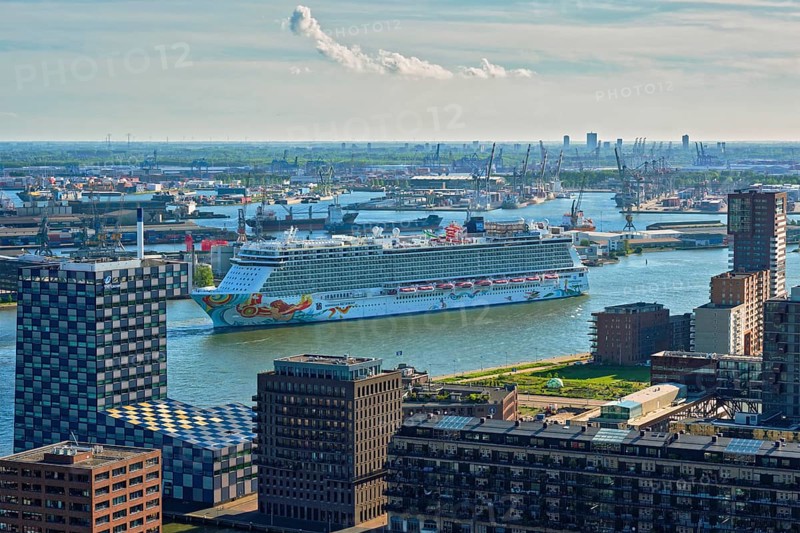 ROTTERDAM, NETHERLANDS, MAY 14, 2017: View of Rotterdam city with cruise liner in Nieuwe Maas river from Euromast