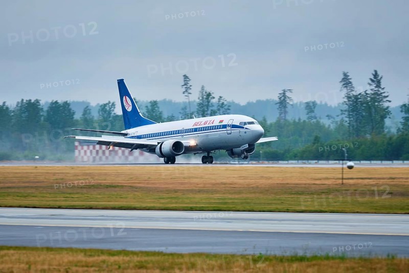 MINSK, BELARUS, JUNE 15, 2018: Belavia belarusian airlines flight Boeing 737-300 plane landing on runway in National Airport Minsk