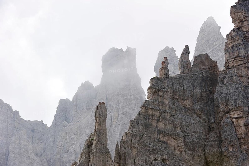 Mountain ridge in the mist in the Dolomites, Italy, Europe