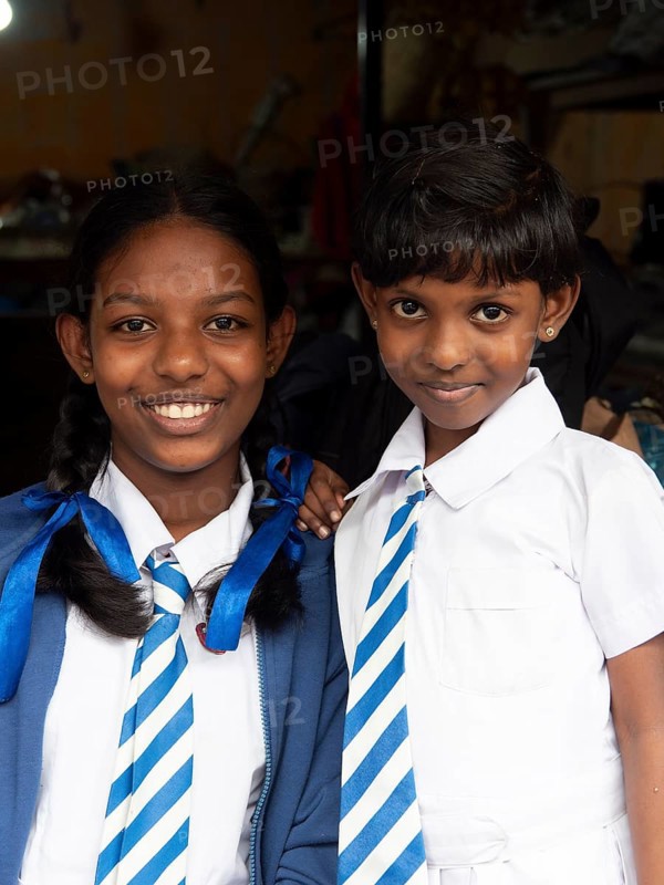 Sinhalese schoolgirls with white-blue clothes, ties, pigtails with blue ribbons, Sri Lanka, Asia