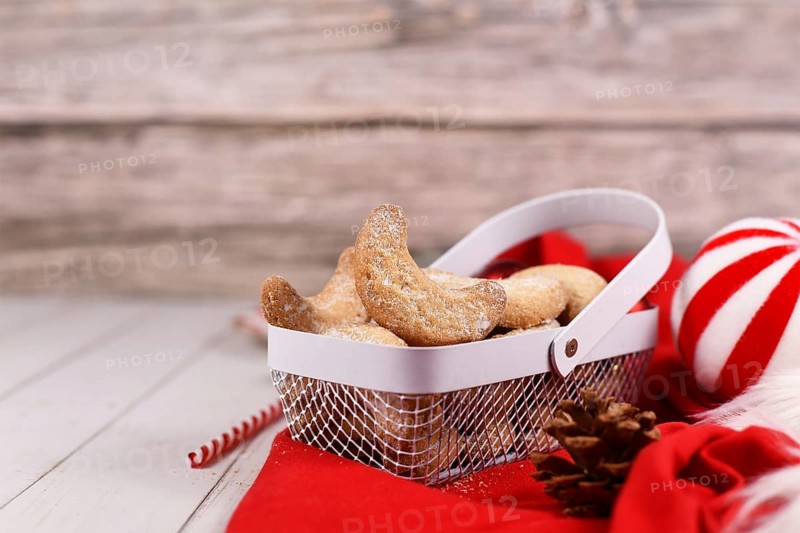 Cescent christmas cookies called 'Vanillekipferl', a traditional Austrian or German Christmas biscuits with nuts and icing sugar