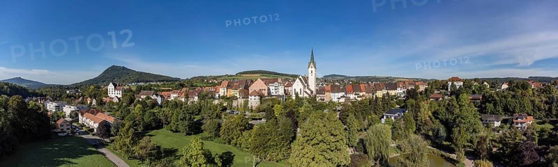 Aerial view of the old town of Engen with the Church of the Assumption of the Virgin Mary, on the left the Hegau volcanoes Hohenhewen and Hohenstoffeln, Constance district, Baden-Württemberg, Germany, Europe