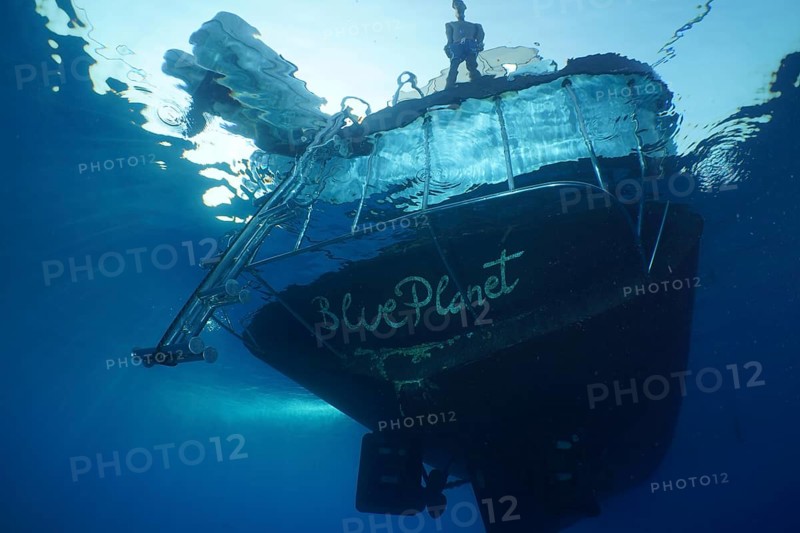 Safari boat, dive boat, livaboard Blue Planet from below, ladder, exit. Dive site Shaab El Erg, Hurghada, Egypt, Red Sea, Africa