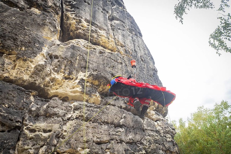 Winch rescue training of the rescue helicopter, Christoph 62, on the occasion of the 50th anniversary of the DRF Luftrettung. The rescue of casualties in the Elbe Sandstone Mountains will be practised