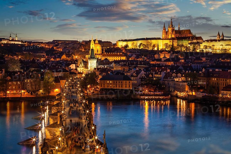 Night view of Prague castle and Charles Bridge over Vltava river in Prague, Czech Republic. Prague, Czech Republic, Europe