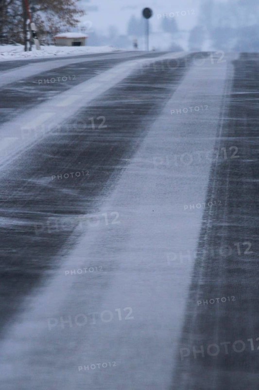 Winter time, snow drift over road, Saxony, Germany, Europe