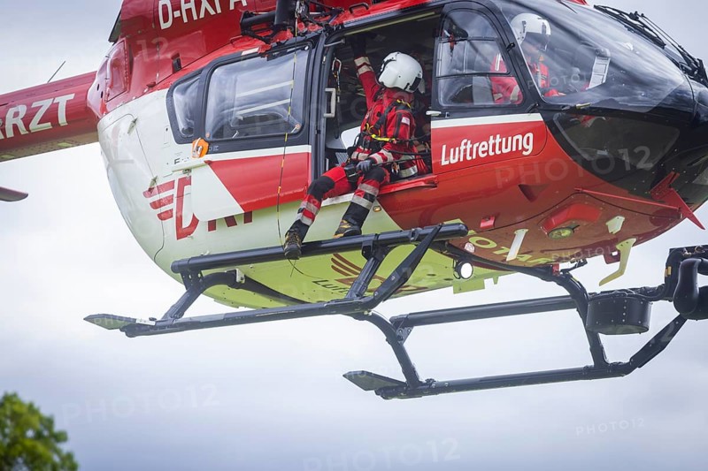 Winch rescue training of the rescue helicopter, Christoph 62, on the occasion of the 50th anniversary of the DRF Luftrettung. The rescue of casualties in the Elbe Sandstone Mountains will be practised