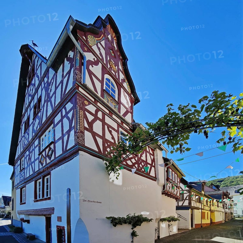 Stork house half-timbered house with wine arch, Bremm, Rhineland-Palatinate, Germany, Europe