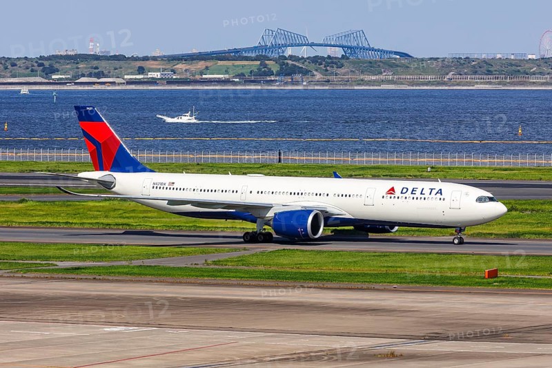 A Delta Air Lines Airbus A330-900 aircraft with the registration number N421DX at Tokyo Haneda Airport (HND) in Tokyo, Japan, Asia