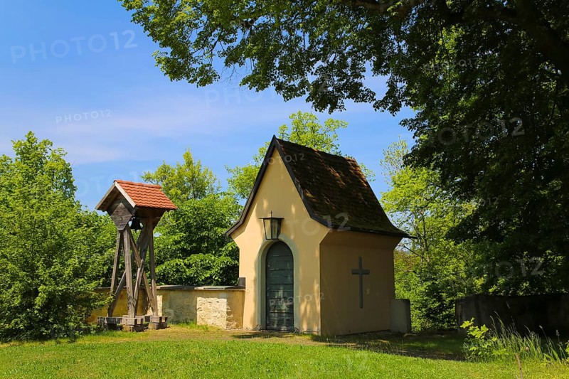 Death house on the western castle wall, Grafeneck Castle, small chapel, lamp, lamp, cross, small church, bell, former hunting lodge of the Dukes of Württemberg around 1560, later summer residence of Duke Carl Eugen von Württemberg, Grafeneck killing centre during the Third Reich, today home for the disabled of the Samaritan Foundation and memorial, documentation centre, historical building, architecture, Gomadingen-Grafeneck, Swabian Alb, Baden-Württemberg, Germany, Europe
