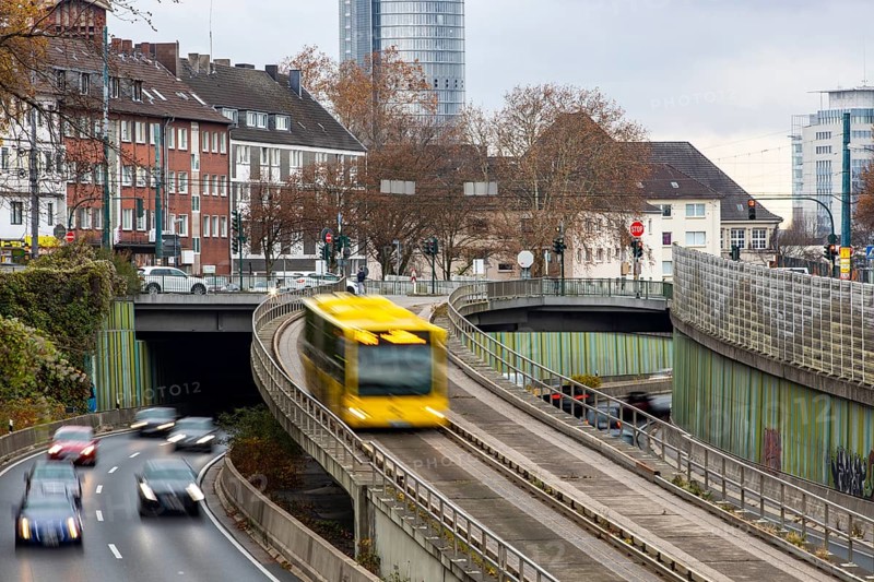 Motorway A40, Ruhrschnellweg, skyline of the city centre of Essen, exit Essen-Huttrop, track bus route, this area would also be affected by a diesel driving ban, Essen, North Rhine-Westphalia, Germany, Europe