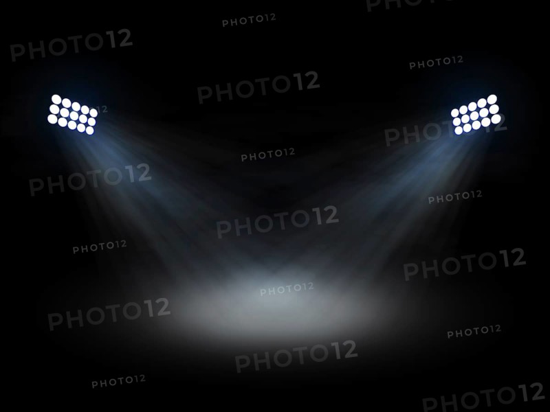 Stadium theater floolights spotlights with light beams on black background
