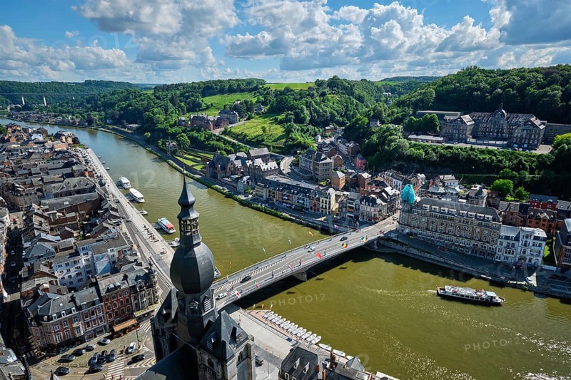 Aerial view of Dinant town, Collegiate Church of Notre Dame de Dinant, River Meuse and Pont Charles de Gaulle bridge from Dinant Citadel. Dinant, Belgium, Europe