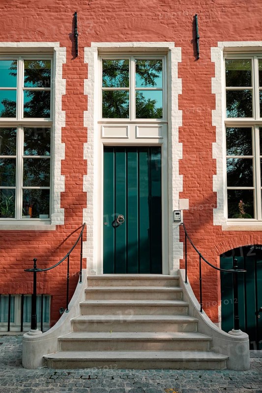 Brugge door with doorstep and window of an old Eurupean house. Bruges, Belgium, Europe