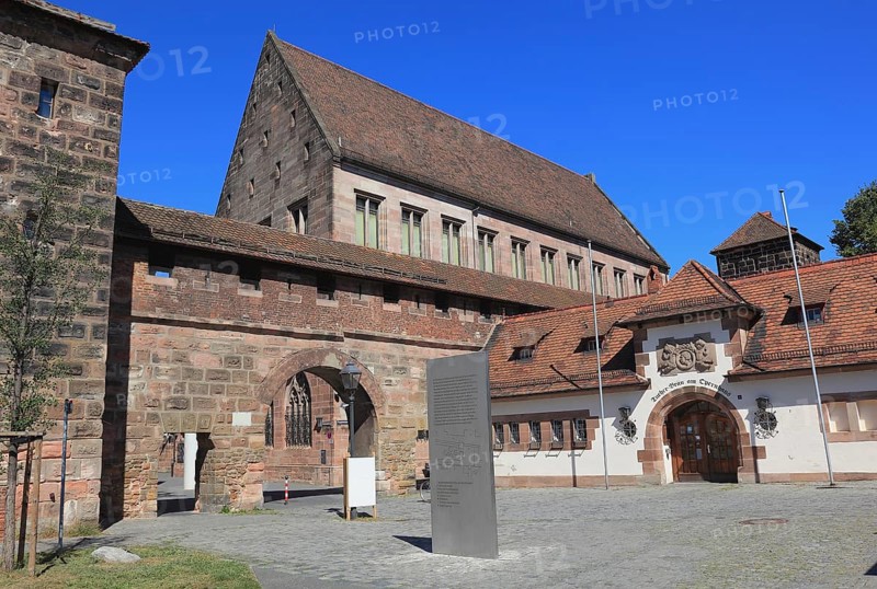 In the historic centre of Nuremberg, the Carthusian Gate, behind it the building of the Germanic National Museum, Middle Franconia, Bavaria, Germany, Europe