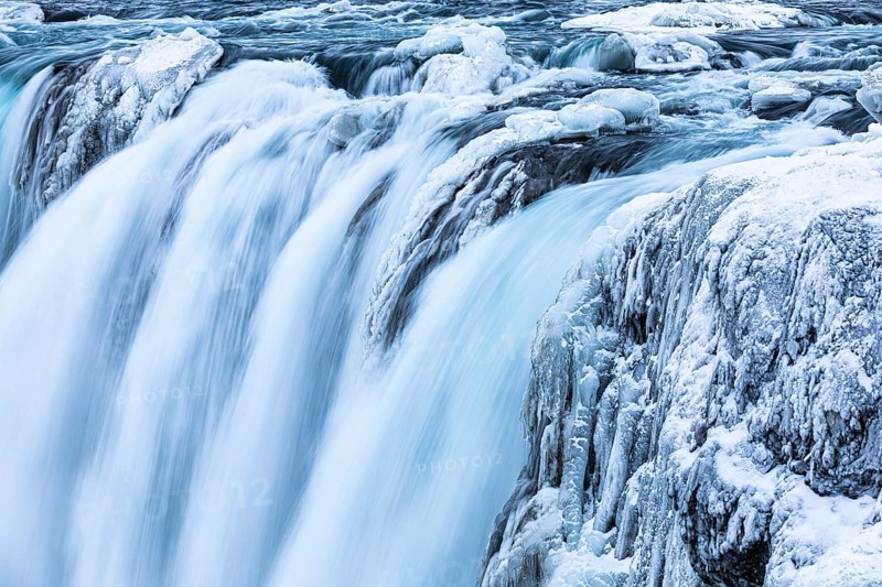 Godafoss waterfall, icy and snowy rock face, Northern Iceland Eyestra, Iceland, Europe