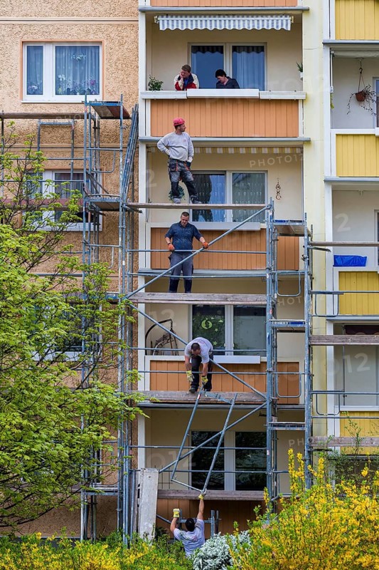Dresden Plattenbau refurbishment in the Dresden Leubnitz area. Scaffolding in front of thermal refurbishment. The prefabricated buildings of type IW67 from 1977 are modernised and brought up to the prescribed standard in terms of air-conditioning technology