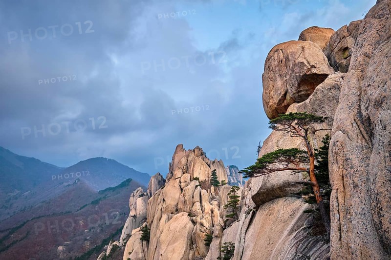 View of stone and rock formations from Ulsanbawi rock peak in stormy weather. Seoraksan National Park, South Corea