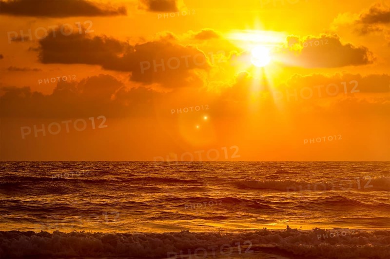 Ocean sunset at Baga beach. Goa, India, Asia