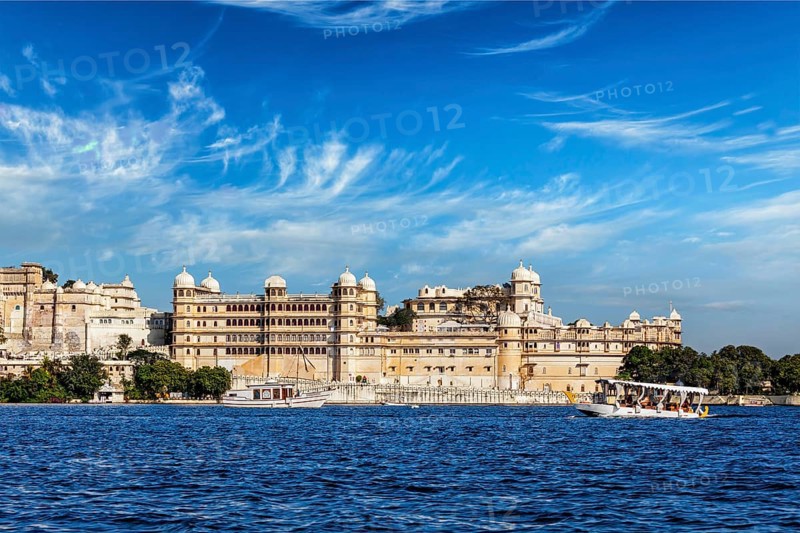 India luxury tourism concept background, Udaipur City Palace from Lake Pichola. Udaipur, Rajasthan, India, Asia