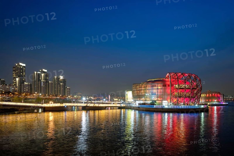 SEOUL, SOUTH KOREA, APRIL 7, 2017: Some Sevit culture complex on artificial floating islands located near the Banpo Bridge illuminated at night, Seoul, South Korea, Asia