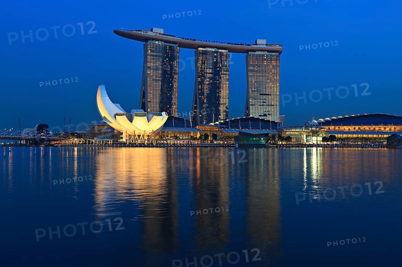 SINGAPORE, MAY 6: The Marina Bay Sands complex on sunset on May 6, 2011 in Singapore. Marina Bay Sands is an integrated resort and billed as the world's most expensive standalone casino property