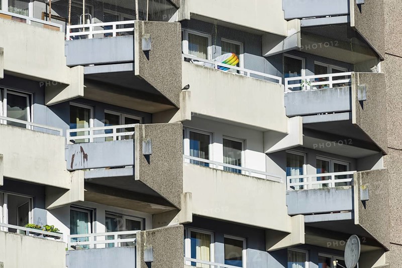High-rise residential building with balconies and satellite dishes, Trabantenstadt Chorweiler in Cologne, North Rhine-Westphalia, Germany, Europe