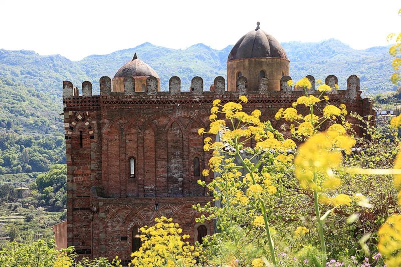 Church of Santi Pietro e Paolo d Agro is a Norman building near Casalvecchio Siculo, Church of Peter and Paul, dome and in front of it flowering giant fennel (Ferula communis), Sicily, Italy, Europe