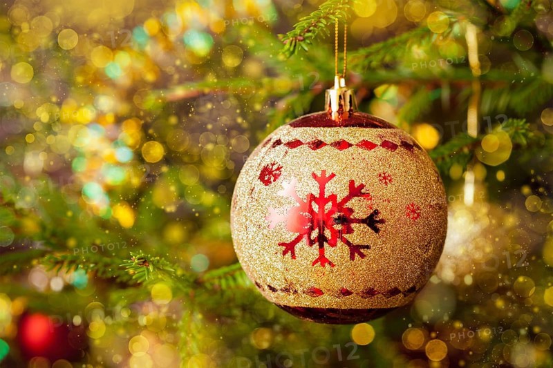 Christmas celebration holiday background, christmas-tree decoration bauble on decorated Christmas tree with defocused blurred lights bokeh and copyspalce