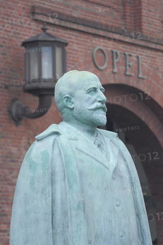 Monument and statue to Adam Opel 1837-1895 with inscription, personality, main portal, Rüsselsheim, Hesse, Germany, Europe