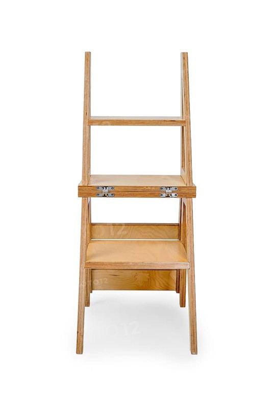 Foldable wooden chair transforming into stepladder on white background