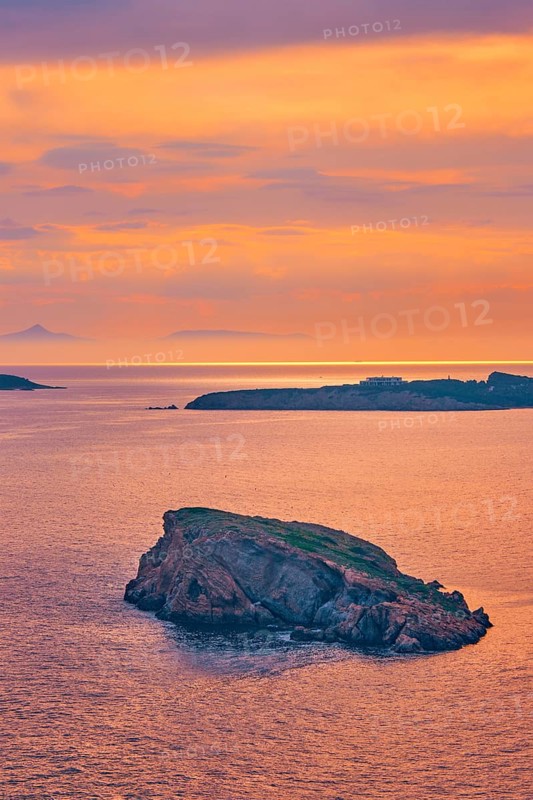 Aegean Sea with Greek islands view on sunset. Cape Sounion, Greece, Europe