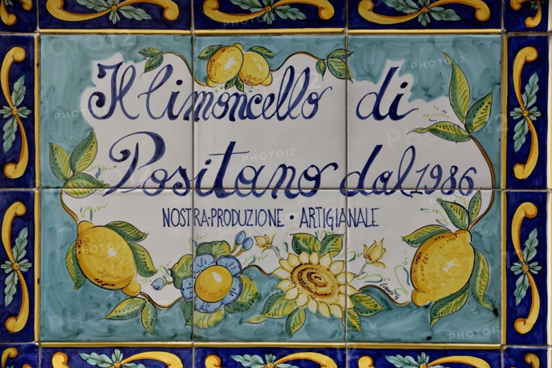 Wall tiles with advertising for Limoncello, Italian liqueur made of lemons, Positano, Amalfi Coast, Costiera Amalfitana, Province of Salerno, Campania, Italy, Europe
