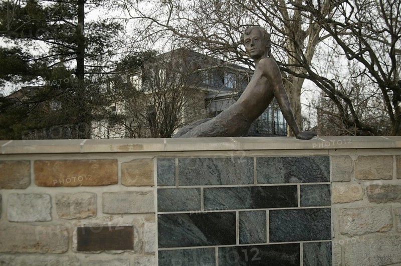Bronze sculpture on the wall of the Erich Kästner Museum in Dresden