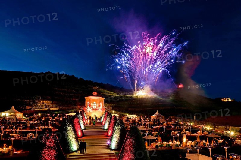 Summer night ball at Wackerbarth Castle. Schloss Wackerbarth or Wackerbarths Ruh' is a baroque castle surrounded by vineyards in the Niederlößnitz district of Radebeul on the road to Meissen, which serves as the seat of the Saxon State Winery. The winery belongs to the large Lößnitz vineyard and is located in the single vineyard Radebeuler Johannisberg