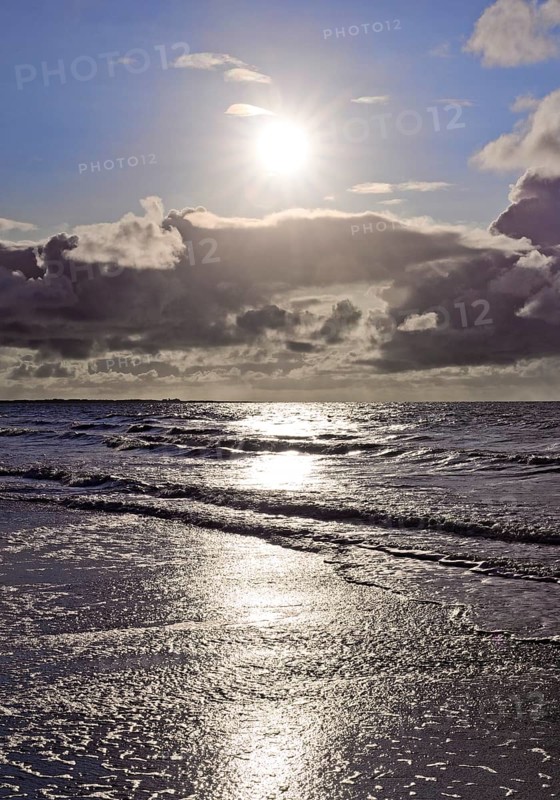 Outgoing tidal fringe in the mudflat landscape with dramatic clouds, North Sea, Norderney Island, East Frisia, Lower Saxony, Germany, Europe