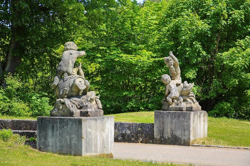 Putti, putti, group of putti in the castle garden, sculpture, stone sculpture, naked child figure, Grafeneck Castle, former hunting lodge of the Dukes of Württemberg around 1560, later summer residence of Duke Carl Eugen von Württemberg, Grafeneck killing centre during the Third Reich, today home for the disabled of the Samaritan Foundation and memorial, documentation centre, historical building, architecture, Gomadingen-Grafeneck, Swabian Alb, Baden-Württemberg, Germany, Europe