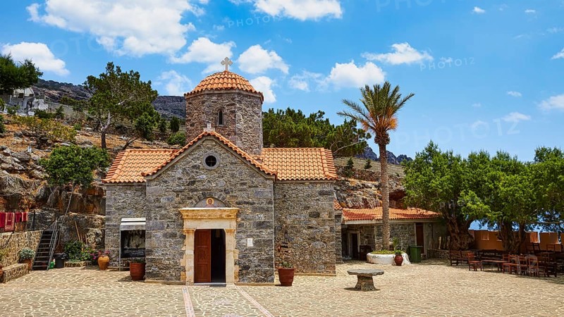 Church, stone building, red tiled roof, dome, palm tree, forecourt, Koudouma, Orthodox monastery, Zemtralkreta, south coast, Heraklion province, Crete, Greece, Europe