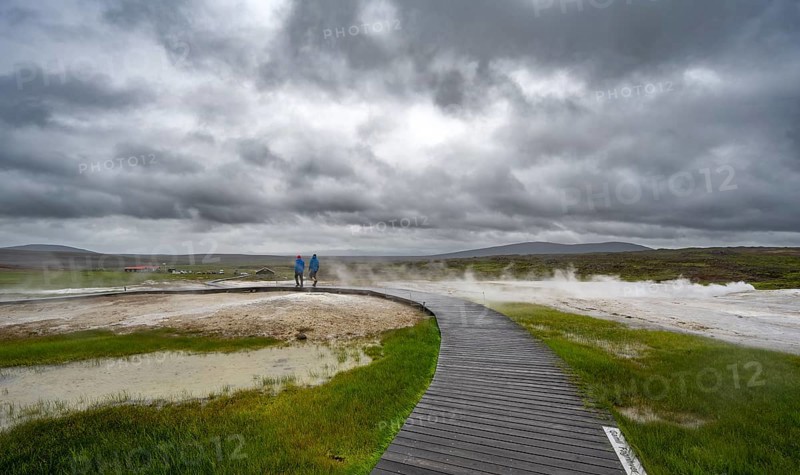 Tourists on a wooden path, steaming hot springs, Hveravellir geothermal area, Icelandic highlands, Suðurland, Iceland, Europe
