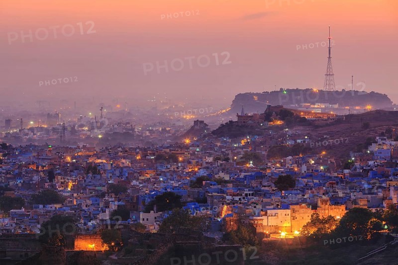 Aerial view of Jodhpur (aka Blue City due to the vivid blue-painted Brahmin houses around Mehrangarh Fort) in the evening twilight. Jodphur, Rajasthan
