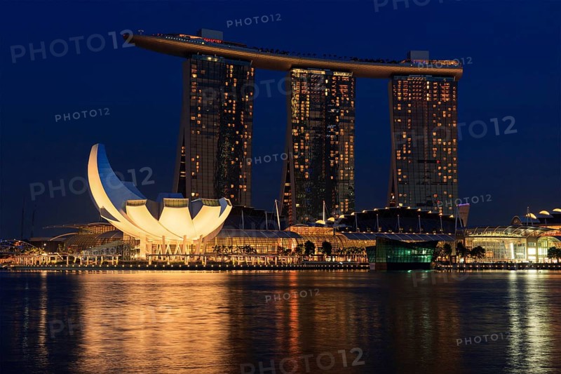 SINGAPORE, MAY 6: The Marina Bay Sands complex on sunset on May 6, 2011 in Singapore. Marina Bay Sands is an integrated resort and billed as the world's most expensive standalone casino property