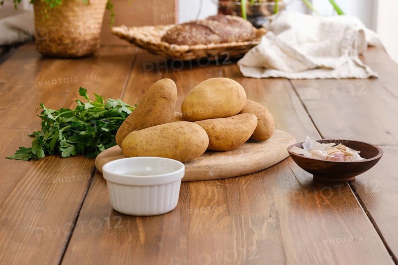 Ingredients for potato pancakes on a table