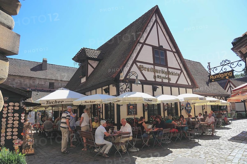 In the old town centre of Nuremberg, Franconian restaurant, Bratwurstgloecklein, in the Handwerkerhof, formerly Waffenhof and the Frauentorturm, Middle Franconia, Bavaria, Germany, Europe