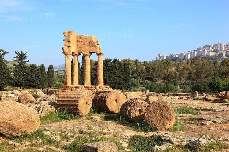 In the Parco Valle dei Templi di Agrigento, Unesco World Heritage Site, remains of the ancient city of Akragas in the Valley of the Temples of Agrigento, remains of the Temple of Dioscuri at Porta V, Sicily, Italy, Europe