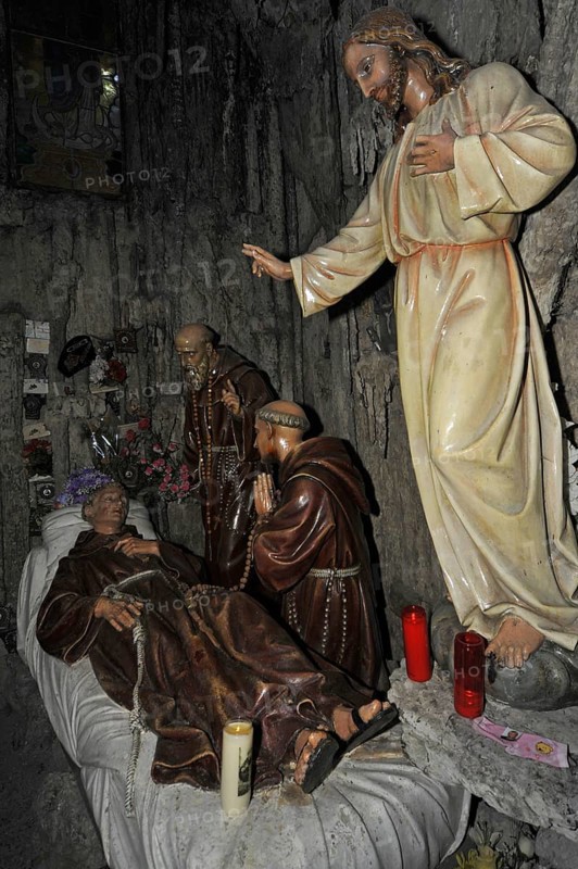Interior of the Grotto of St Anthony of Padua, Saint-Antoine de Padoue showing praying monks at deathbed, Crupet, Namur, Belgian Ardennes, Belgium, Europe