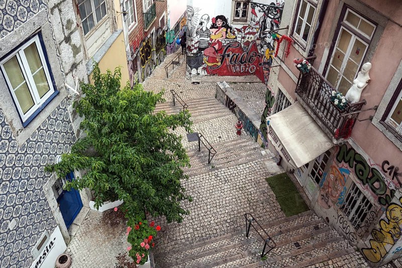 Alley with murals, alleyway art, graffiti, Escadinhas de São Cristóvão, historic centre, Lisbon, Portugal, Europe