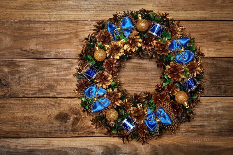 Christmas wreath on wooden background