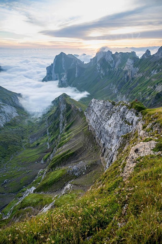 View over Säntis mountains into the valley of Meglisalp at sunrise, high fog in the valley, Säntis, Appenzell Ausserrhoden, Appenzell Alps, Switzerland, Europe