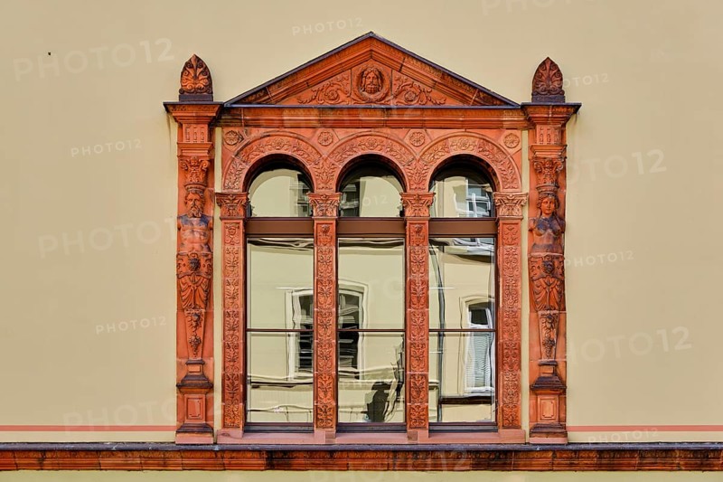 Window gables and windows on the front façade of the Fürstenhof, the Renaissance-era princely residence of the Hanseatic city of Wismar, Mecklenburg-Western Pomerania, Germany, Europe